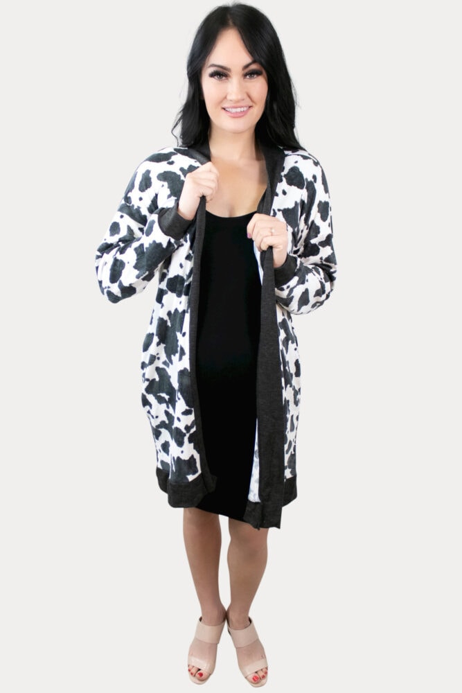 Step outside the normal animal patterns, and add a fun cow print maternity cardigan to your mama wardrobe!